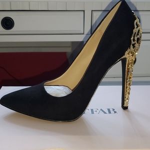 Black and gold heels